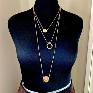 Gold chain necklace. 3 chains can be added and removed.